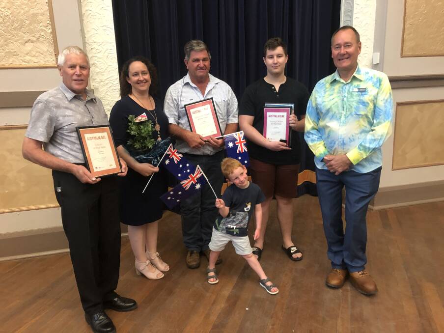 Junee Citizen of the Year John Foord, Junee Business and Trades members Natalie Phillips and Tony Butt, Young Citizen of the Year Oliver Phillips, mayor Neil Smith and front, Jack Leslie Picture: Rachel McDonald