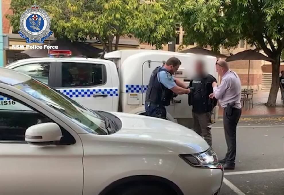 Police arrest a man in Lismore on Saturday. The 45-year-old is accused of threatening a woman with a knife before taking her car in Griffith on Monday. Picture: NSW Police 