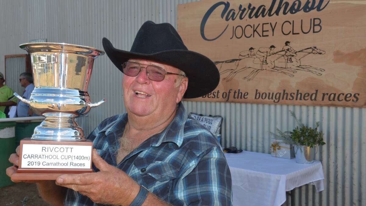 YOU BEAUTY: Griffith trainer Russell Hogan celebrates after his horse Cooee March won the Carrathool Cup on Saturday. Picture: Declan Rurenga