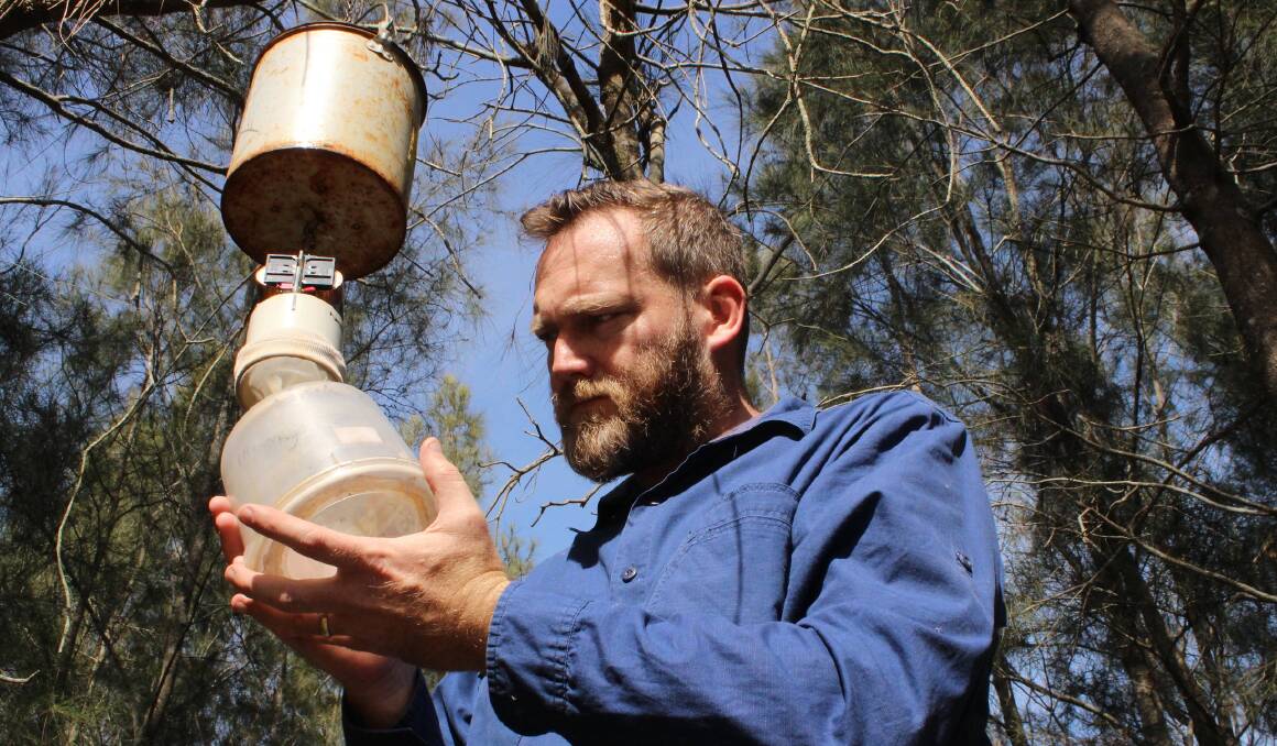 Mosquito expert Dr Cameron Webb with a mozzie trap. He said the disease risk from these insects following widespread flooding has increased. Picture supplied