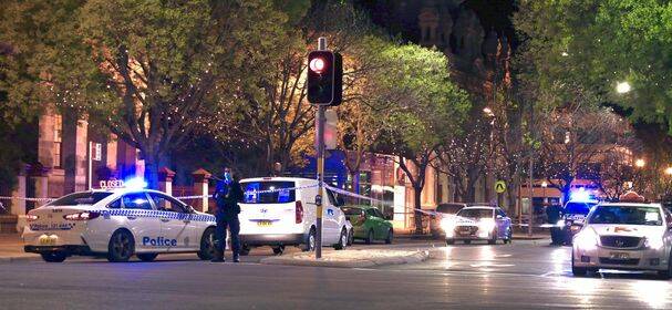 Police set up a crime scene in Dean Street, Albury, on Saturday evening.