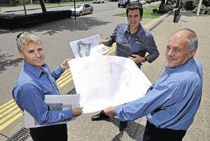 START LINE: Riverina Motor Complex management committee chairman Daryl Day, planning consultant Gary Salvestro and spokesman Doug Wait show off the plans for the proposed race track and driver training centre yesterday.