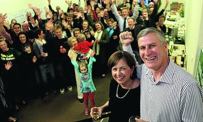 SWEET VICTORY: Michael McCormack with his wife Catherine celebrates his win last night at the National Party�s electoral office. Picture: Glenn Henderson