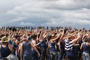 BLUE PRIDE: More than 1700 people trudged their way through the mud and into the sports arena at the Deni Ute Muster for the blue singlet count. Pictures: Lily Huntly