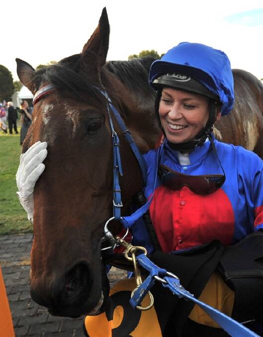 ALL SMILES: Kathy O'Hara and Voice Commander share a special moment after winning  yesterday's Wagga Gold Cup. Picture: Les Smith