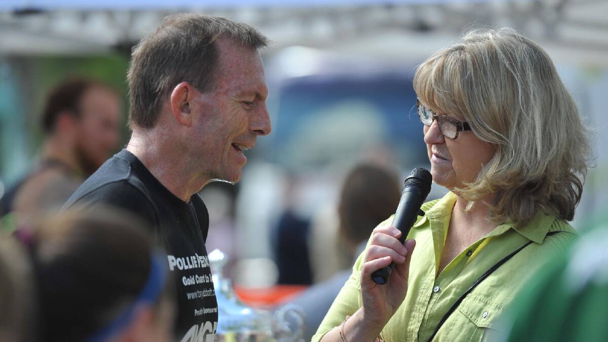 Tony Abbott and event MC Leigh Spokes. Picture: Oscar Colman