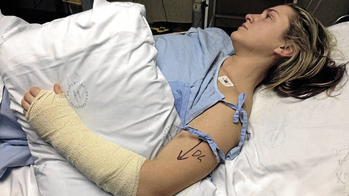 SORE AND SORRY: Stephanie Brown, 24, rests up in Wagga Base Hospital yesterday after recovering from surgery on her wrist following an accident involving a car on Monday.