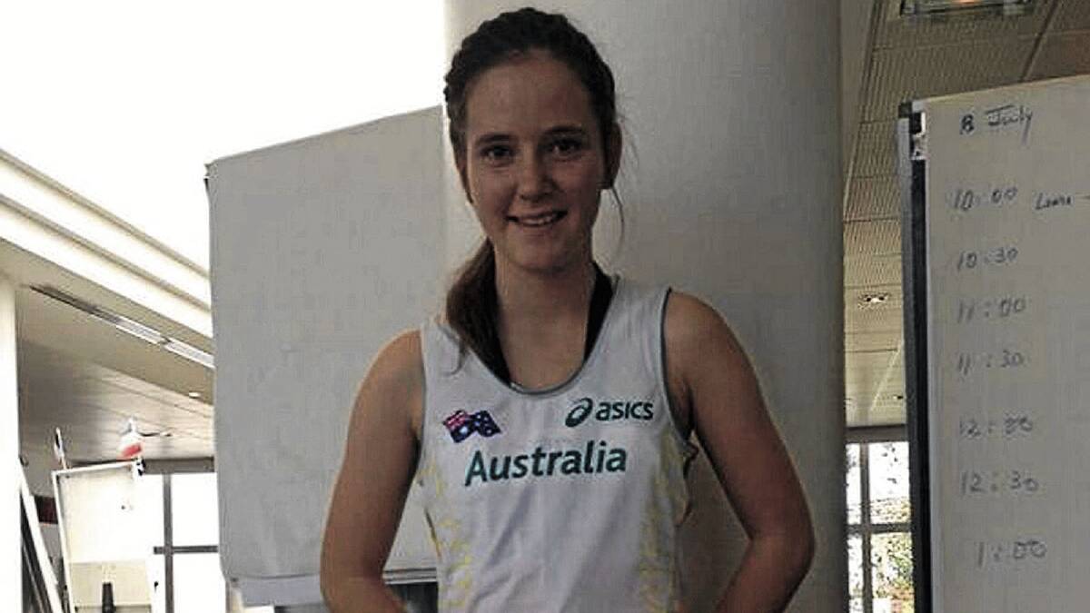 GREEN AND GOLD: The youngest member of the Australia team, Wagga teenager Carly Salmon, shows off her uniform during the IPC world championships in France.
