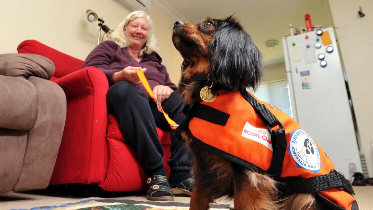 Patricia Wall with her new hearing dog, Ruby. Picture: Les Smith