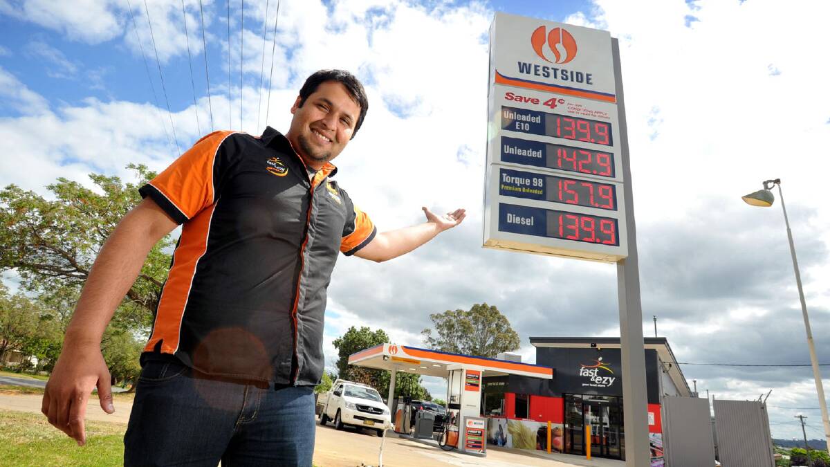 Area manager for Westside Petroleum Shahzaib Khawaja re-opens the old Cherrywood Service Station, which is now selling cheaper fuel. Picture: Les Smith