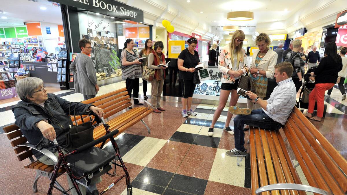 Author Damien Thomlinson was at Wagga Marketplace earlier this week signing copies of his book Without Warning. Picture: Les Smith