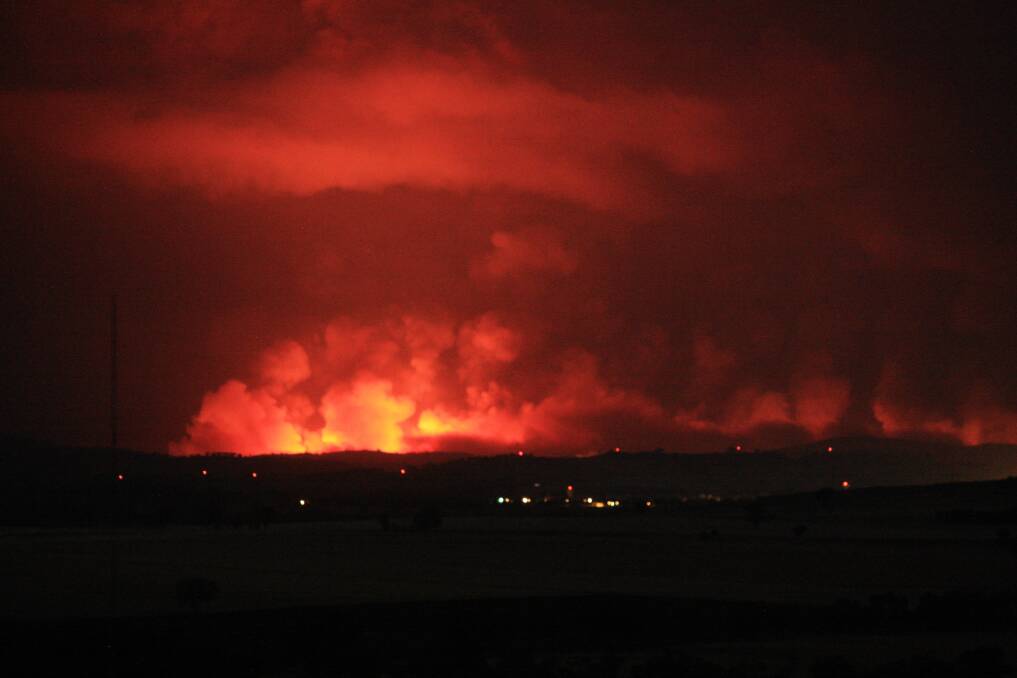 OMINOUS GLOW: The view from Brucedale, about 55km from the Minnimbah fire, last night. Picture: supplied