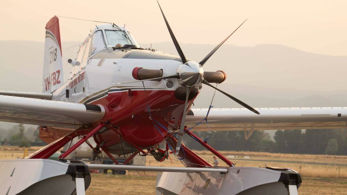 A plane prepares to tackle the Sturgess fire. Picture: Andrew Roberts