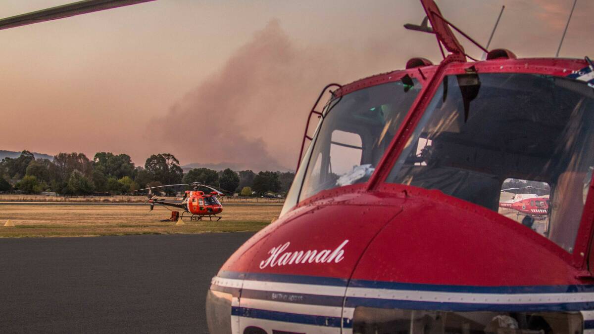 A helicopter gets ready to head to the Sturgess fire. Picture: Andrew Roberts