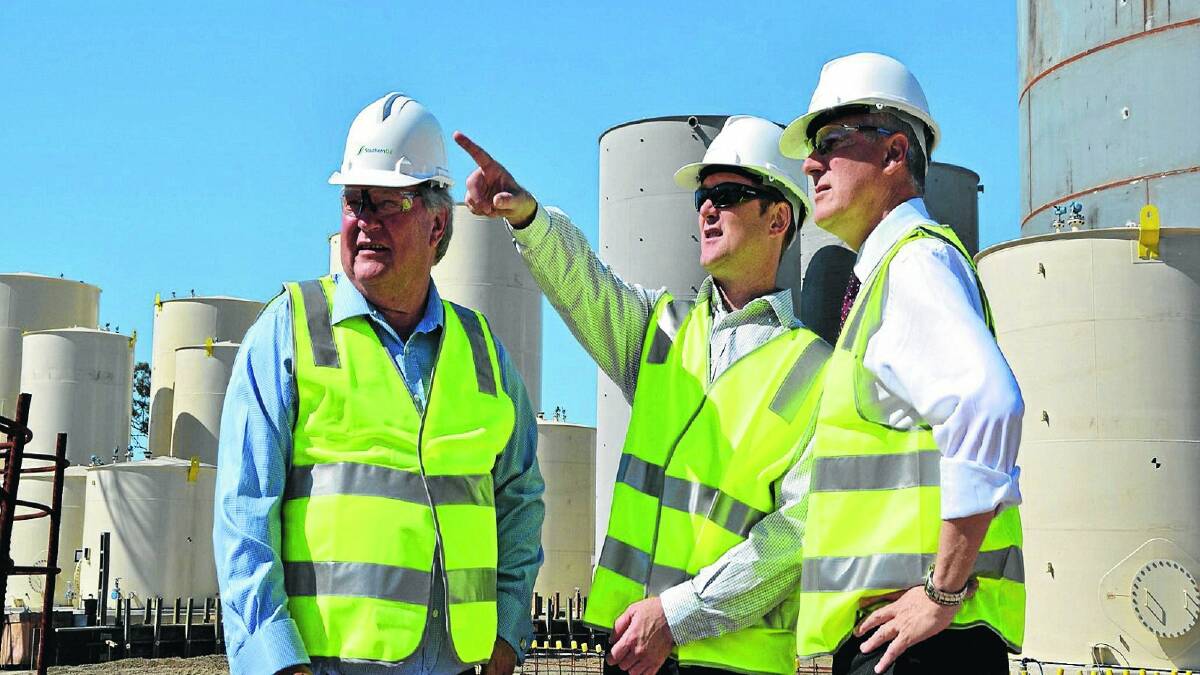 Member for Riverina Michael McCormack (right) and his Queensland Nationals colleague, Flynn MP Ken O’Dowd (left), talk to Southern Oil Refineries managing director Tim Rose at the new Gladstone site. 