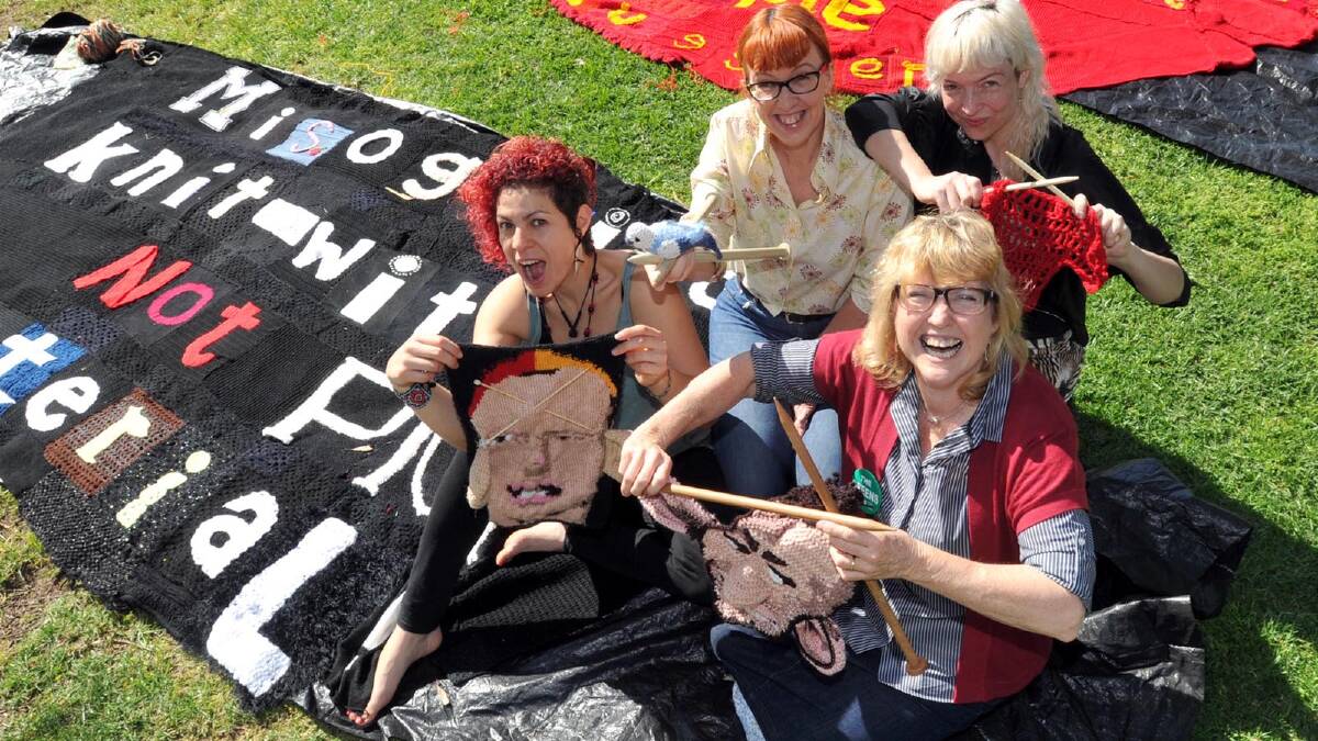 POLITICAL YARN: (From left) Craftivists Marlene Habib, Jacqui Tinkler, Riverina Greens candidate Ros Prangnell and Casey Jenkins sit together with the knitted banners. 	Picture: Les Smith