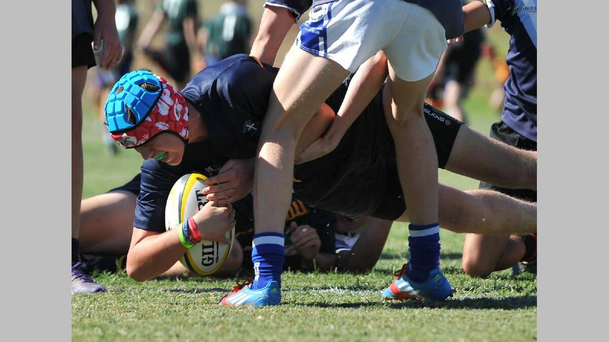 SIRU 10s ... Damiel Johnston (Yanco) goes in for a try against Sacred Heart Cootamundra. Picture: Michael Frogley