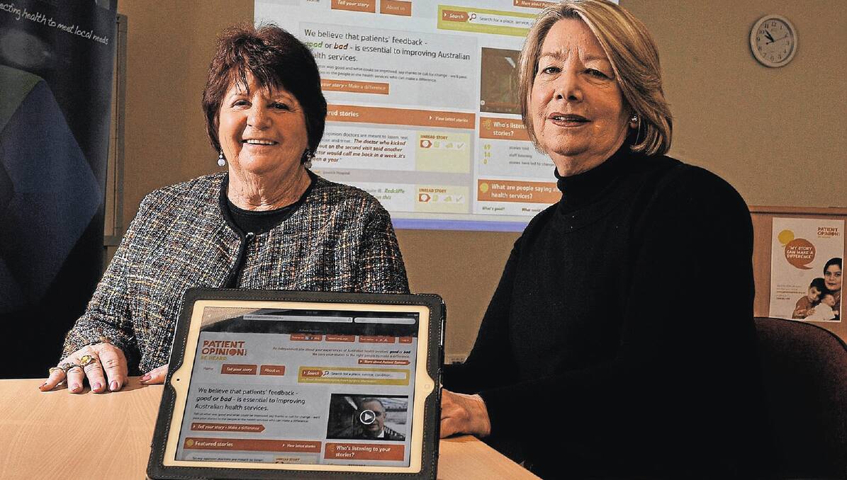 GROWING TOGETHER: Murrumbidgee Medicare Local chief executive officer Nancye Piercy and Murrumbidgee Medicare Local board director Associate Professor Sue McAlpin look over the new Patient Opinion website where people can share their healthcare experiences online. Picture: Oscar Colman