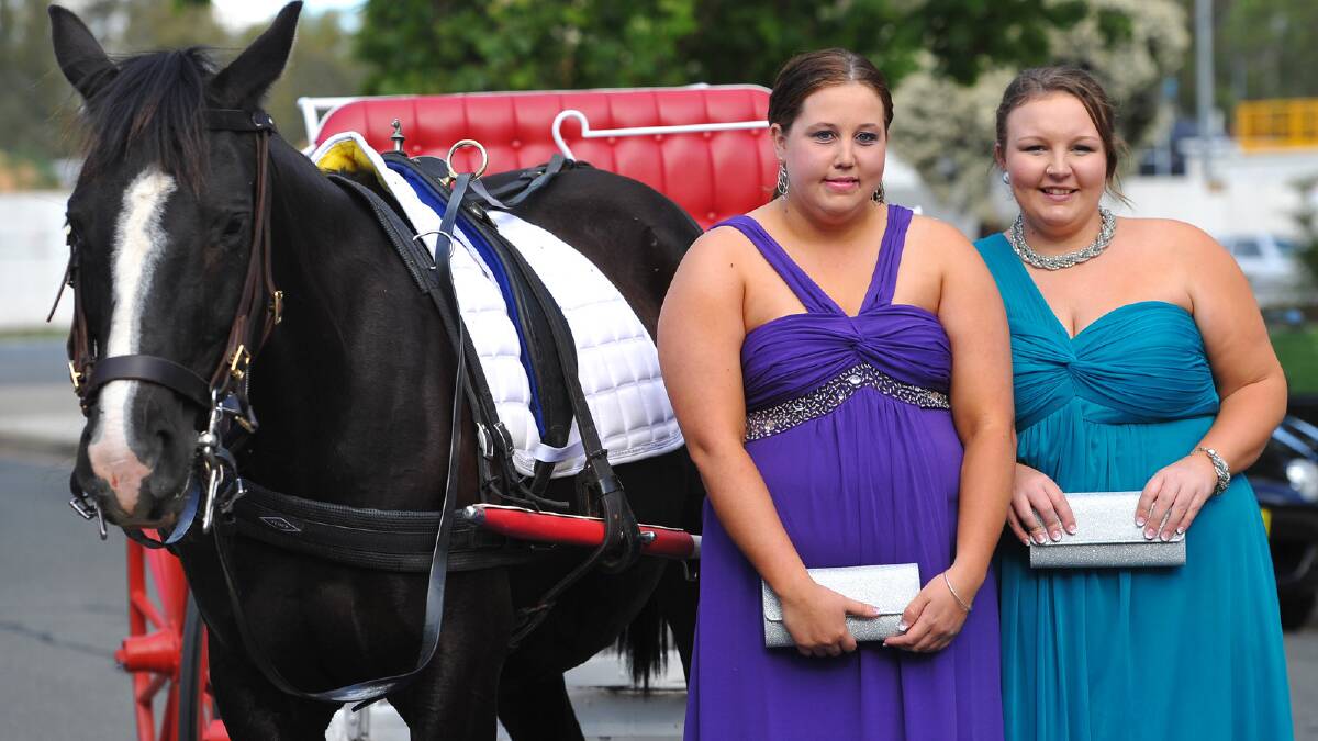 Tamika Raufers and Tiffany McGill arrived on a horse and cart. Picture: Addison Hamilton