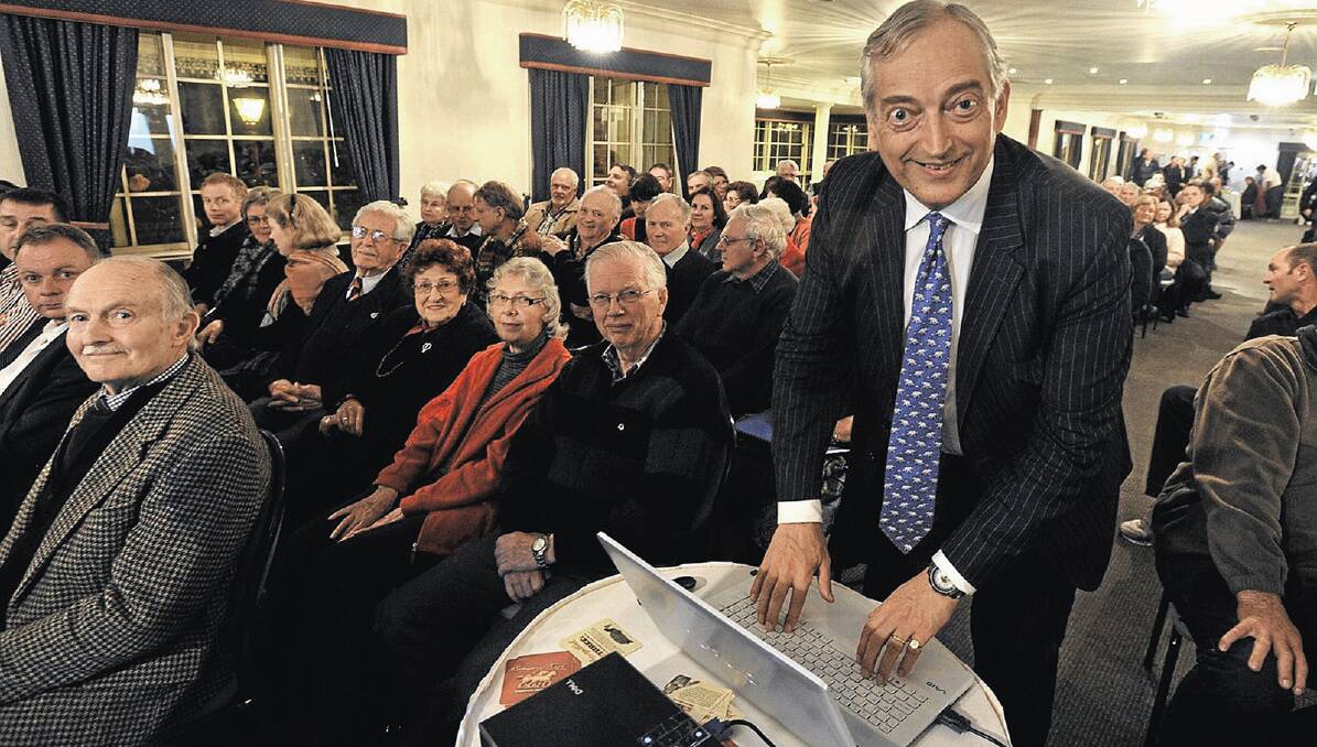 HE’S BACK: Viscount Christopher Monckton prepares to give his presentation to a climate sceptics gathering in Wagga in July last year and will return in February. Picture: Les Smith