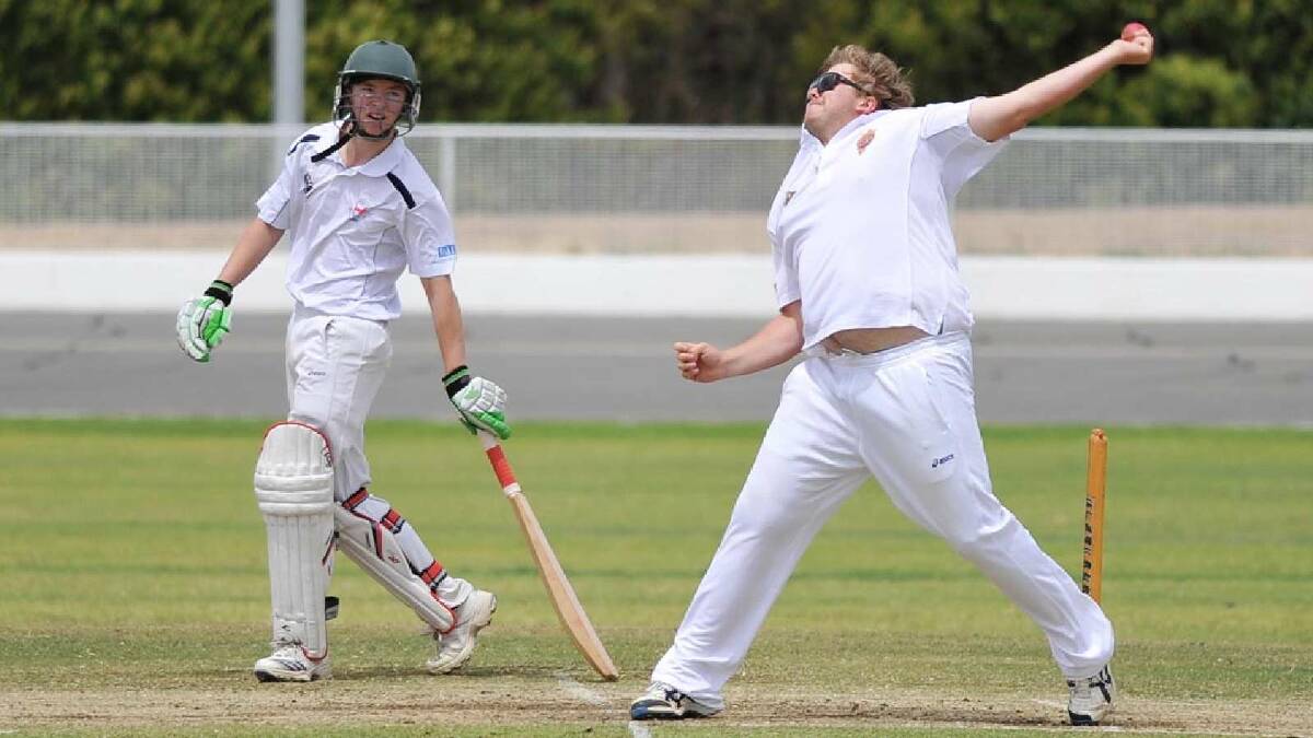 Lake Albert's Todd Francis bowls as St Michaels' Ayden Hill watches on. Picture: Alastair Brook