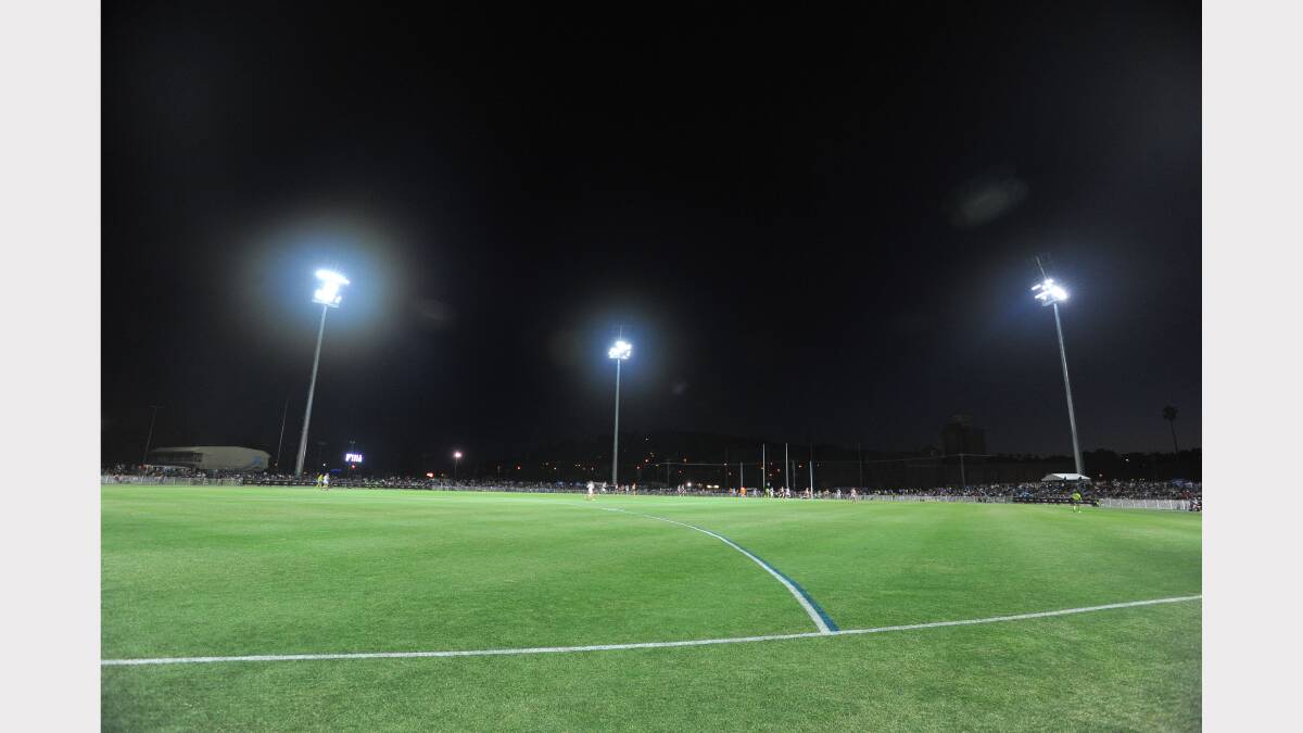 GWS v Brisbane at Robertson Oval - The new Robertson Oval lights in action. Picture: Addison Hamilton