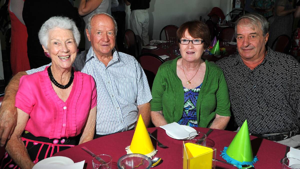 Daphne Dean, Mick Rivers, Bronwyn Hills and Graeme Wilson celebrating New Year's Eve at the Wagga Country Club.