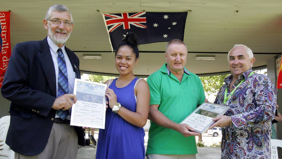 LEETON Shire Council mayor Paul Maytom (left) and Leeton shire Australia Day ambassador Yianni Johns (right) present the young citizen of the year award to Joeleen Nikoro and citizen of the year to Carl King. 