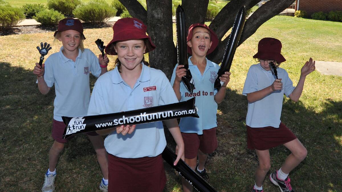 Kooringal Public School students Harriet Priest, 9, Chloe Hinds, 10, Jake Hinds, 7, and Hayley Hinds, 9, ahead of the school's fun run. Picture: Michael Frogley