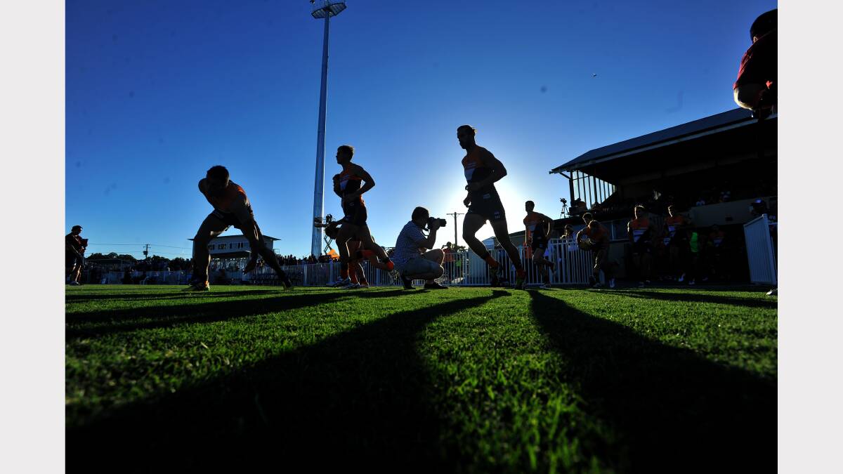 GWS v Brisbane at Robertson Oval - GWS running out onto Robertson Oval. Picture: Addison Hamilton