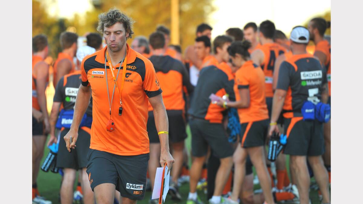GWS v Brisbane at Robertson Oval - GWS players getting instructions in the pre game huddle. Picture: Addison Hamilton