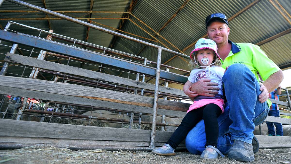 Sophie Howard, 2, and Luke Howard of Culcairn at the Culcairn Centenary Show. Picture: Addison Hamilton