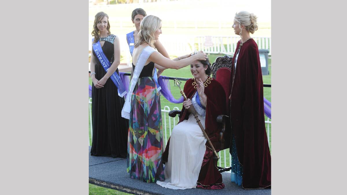 Jane Morton being crowned Miss Wagga by 2013 Miss Wagga Tracy Colman. Picture: Jacinta Coyne