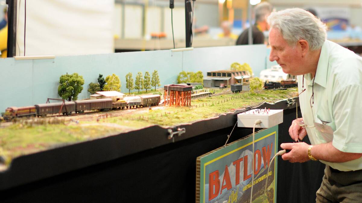 Ray Mudford from Tumut Railway Modellers fine tuned his train at the Model Train Expo. Picture: Jacinta Coyne