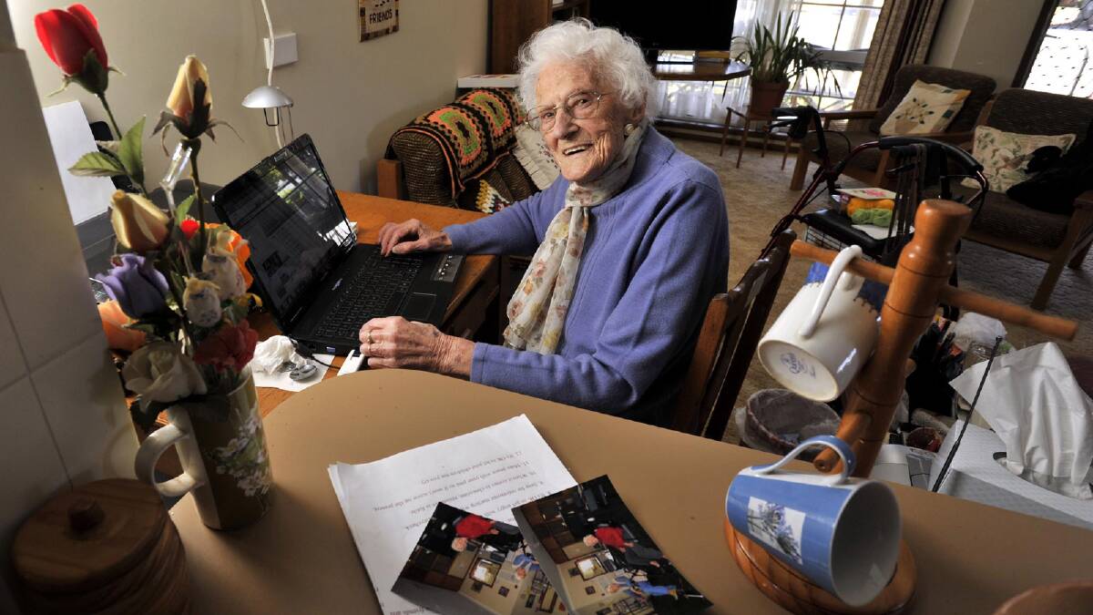 Essie Fountain sits next to her computer at her Temora home. The 98- year-old is an avid user of Facebook, and keeps in contact with friends and family through email. Picture: Les Smith