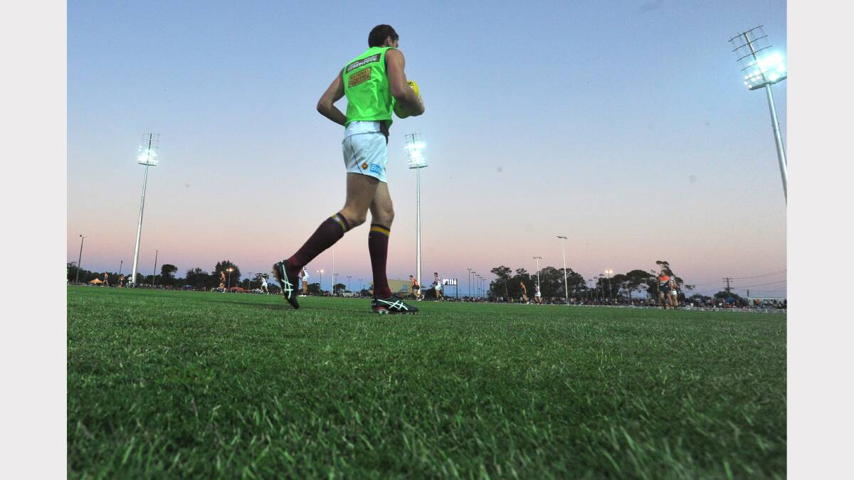 GWS v Brisbane at Robertson Oval - A Brisbane player warming up on the sidelines. Picture: Addison Hamilton