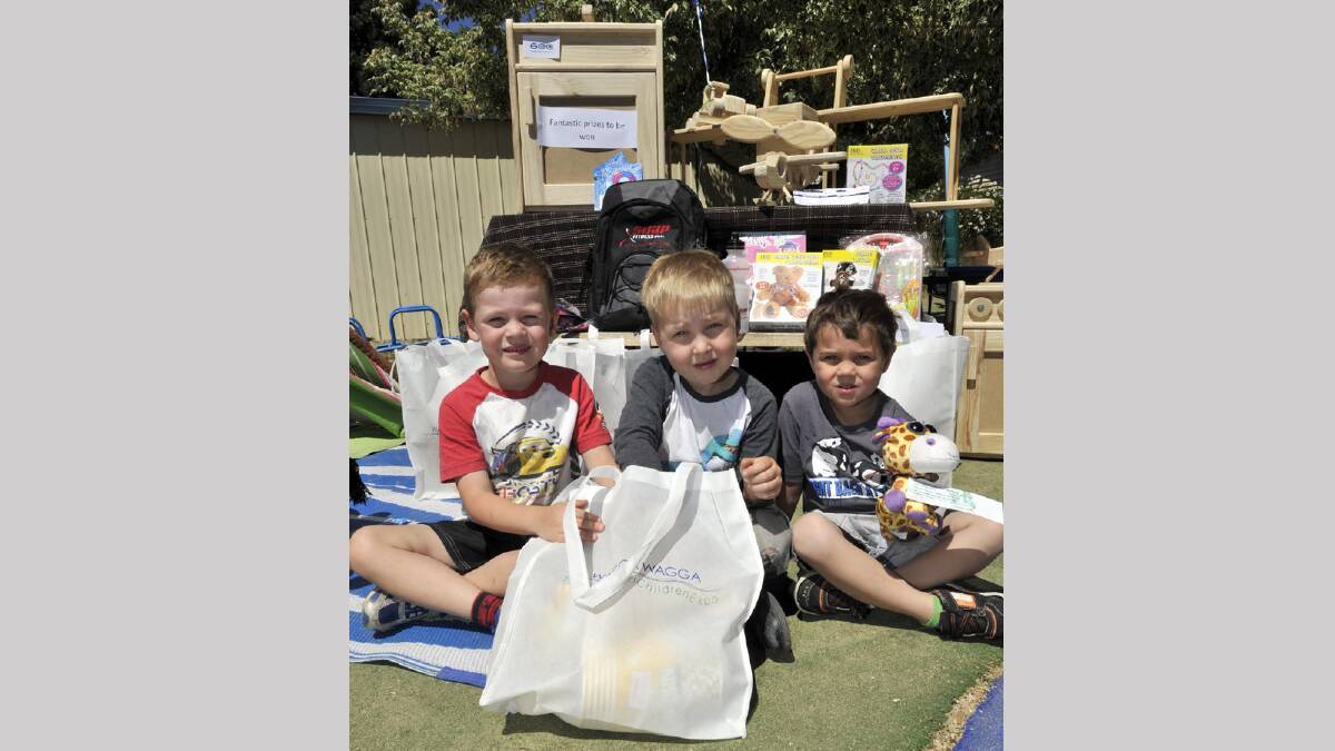 Wagga Goodstart Early Learning Centre students Henry Crawford, 5, Arthur Thomas, 5 and Hunter Blacka, 4, rummage through some of the goodies that will be up for grabs at the Wagga Families and Children Expo. Picture: Les Smith