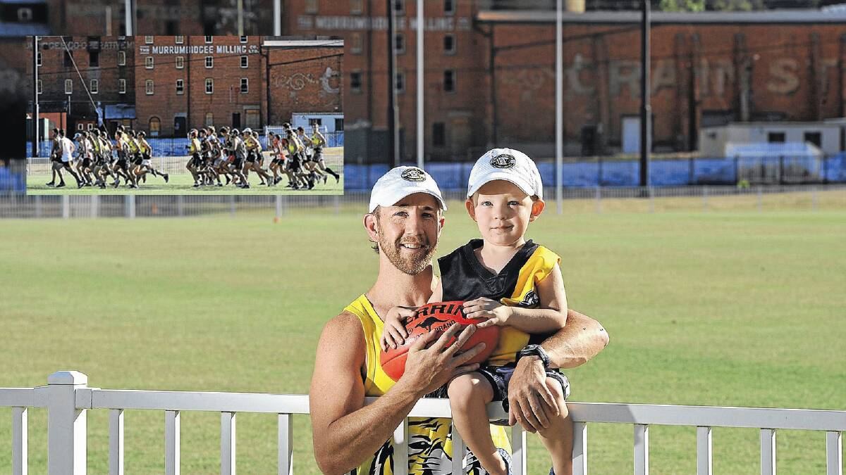 NEW HOME: Wagga Tigers coach Tom Power with his son Archer, 3, during the team’s first training session (inset) back at Robertson Oval. Picture: Addison Hamilton