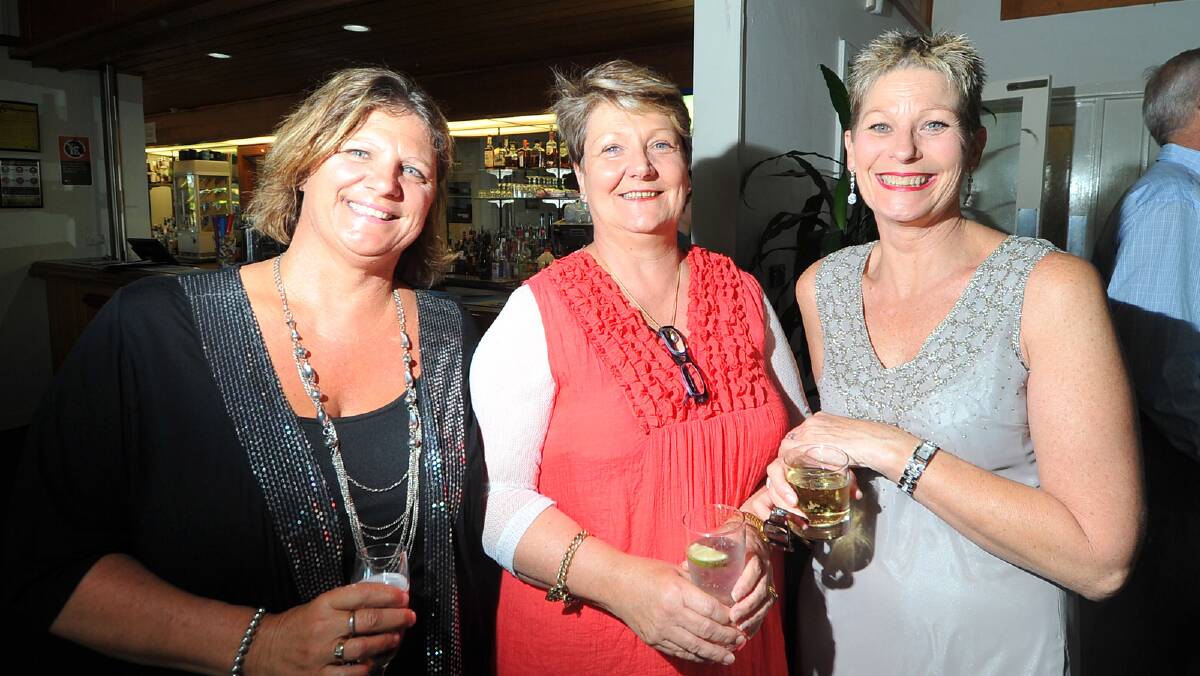Delia Dowdle, Debbie Carroll and Alison Meek celebrate the new year at the Wagga Country Club.