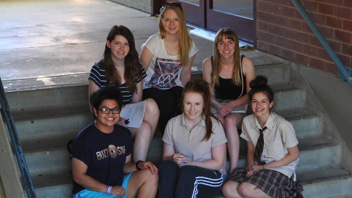 (From left) Kooringal High students Harriet Fletcher, Adele Harvey-Button, Sarah McGill (front) Ariel Hernandez, Briana Grant and Tahnaya Fenwick after the final HSC exam visual arts yesterday. Picture: Addison Hamilton