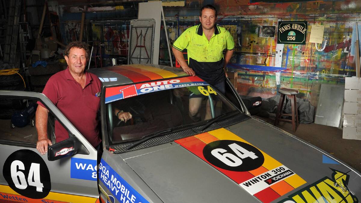 Wagga men Des and Carl Gibbs show off the Mitsubishi Starion that Des won the prestigious Winton 300 with in 1986. The pair will take the same car south this weekend in an attempt to repeat the win. Picture: Michael Frogley