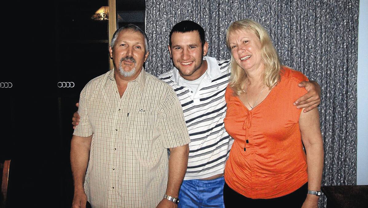 LOVING FAMILY: The late Ben Catanzariti (middle) in a recent photo with parents Barney and Kay Catanzariti. The 21-year-old concreter was killed in a freak workplace accident in Canberra on Saturday morning.