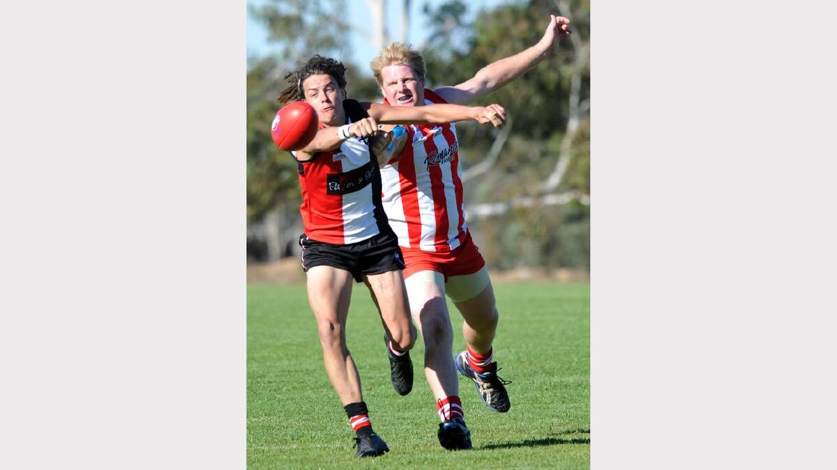 North Wagga's Ben Alexander and CSU's Brodey Farley battle for the ball. Picture: Les Smith